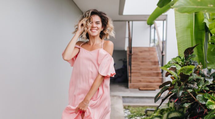 Best Dresses for Curvy Women to Shine in 2024 women wearing pink Dress for Curvy Women